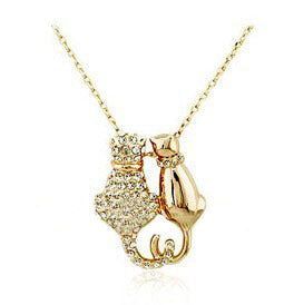 Gold cat-shaped pendant necklace on a white background