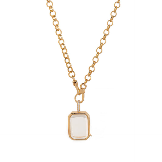 Gold necklace with a pendant on a white background