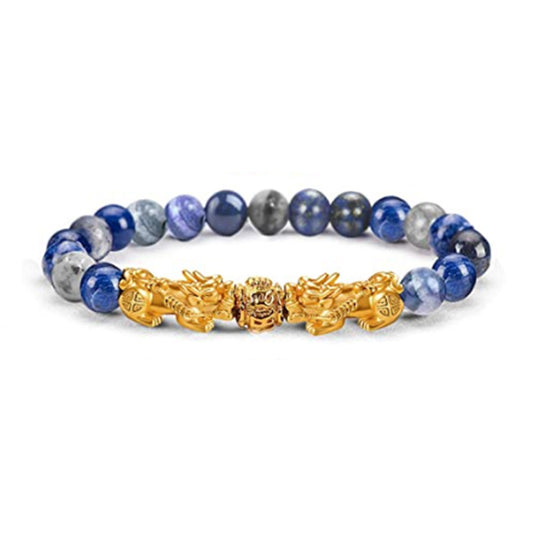 Bracelet with blue and gray beads and gold clasp on a white background