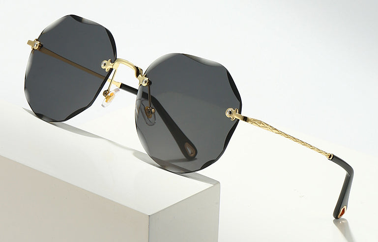 Polygonal Rimless Trimmed Sunglasses