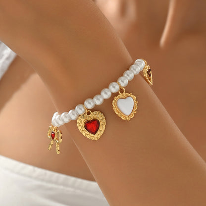 Heart-Shaped Cross Pendant Necklace & Bracelet