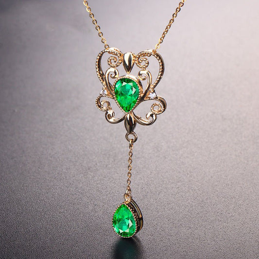 Emerald Color Hollow Bow Pendant Necklace - Trendy Radar