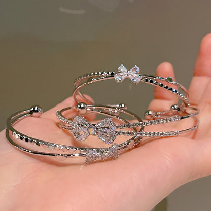 Women’s Minimalist Silver Bow Bracelet - Trendy Radar