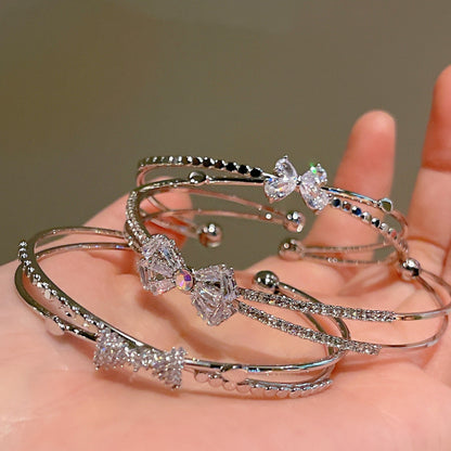 Women’s Minimalist Silver Bow Bracelet - Trendy Radar