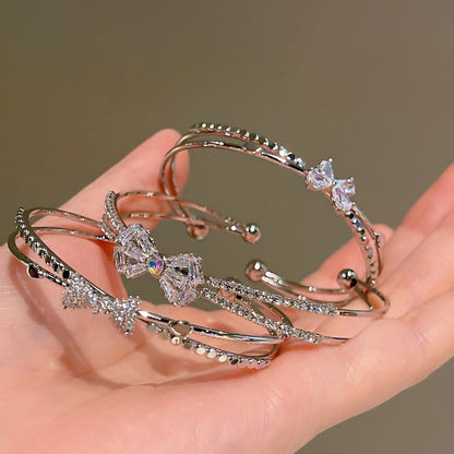 Women’s Minimalist Silver Bow Bracelet - Trendy Radar